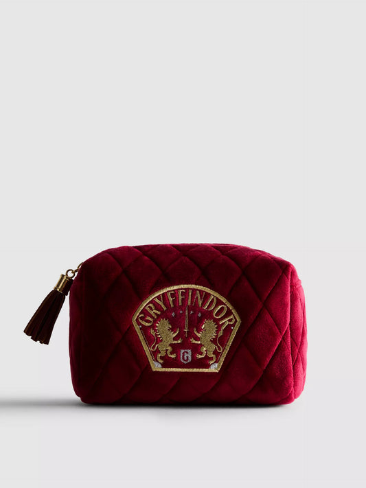 A Harry Potter™ makeup bag with a Gryffindor house emblem design